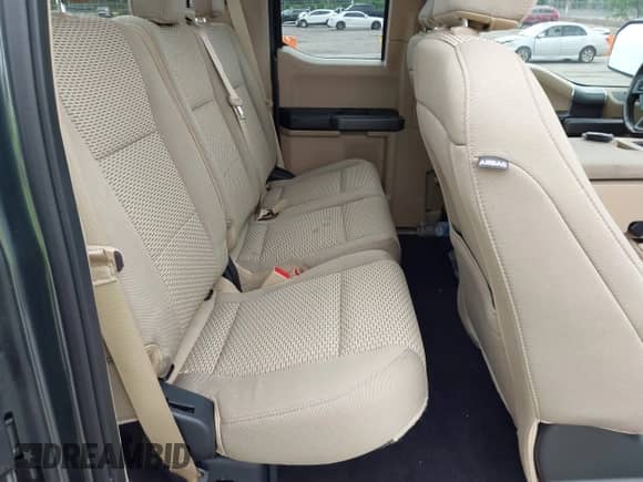 2018 Ford F-150 XL z VIN 1FTEX1EB9JKE64038, wystawiony jako IAAI lot #42388643 z przebiegiem 74 749 mil mil oraz . Historia ofert i sprzedaży dostępna na DreamBid. Obrazek 8.