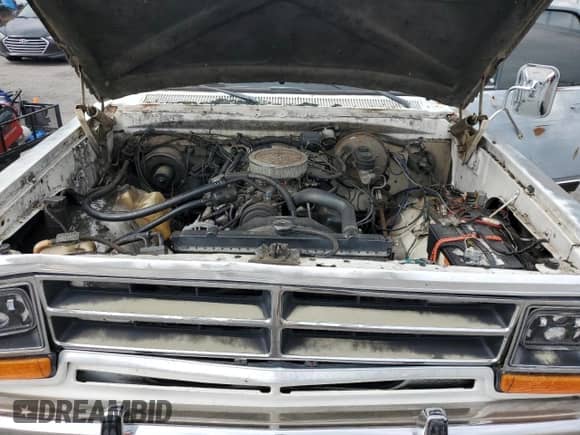 1986 Dodge Trucks with VIN 1B7HD14T1GS028485, listed as a Copart auction lot 67293695 with 43,907 mi miles and Salvage title. Bid and sale history available at DreamBid. Image 11.