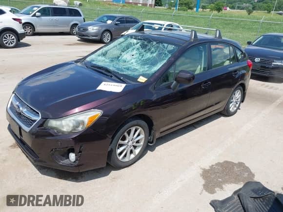 2012 Subaru Impreza Premium with VIN JF1GPAC69CH209880, listed as a IAAI auction lot 42519069 with 109,641 mi miles and . Bid and sale history available at DreamBid. Image 2.