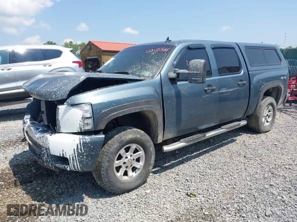 2007 Chevrolet Silverado 1500 1LT z VIN 2GCEK13M971728449, wystawiony jako IAAI lot #42418344 z przebiegiem 221 004 mil mil oraz . Historia ofert i sprzedaży dostępna na DreamBid. Obrazek 2.