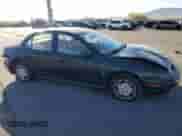 1996 Saturn SL with VIN 1G8ZK5272TZ137198, listed as a Copart auction lot 72446614 with 99,586 mi miles and Salvage title. Bid and sale history available at DreamBid. Image 4.