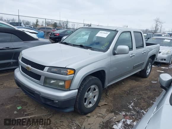 2010 Chevrolet Colorado 1LT z VIN 1GCDSCDE0A8125747, wystawiony jako IAAI lot #41634604 z przebiegiem 120 215 mil mil oraz . Historia ofert i sprzedaży dostępna na DreamBid. Obrazek 17.