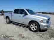 2010 Dodge 1500 SLT with VIN 1D7RB1CT2AS120942, listed as a Copart auction lot 84904935 with 208,726 mi miles and Salvage title. Bid and sale history available at DreamBid. Image 4.
