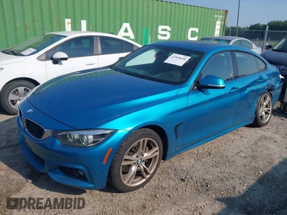 2019 BMW 4 Series 430i xDrive z VIN WBA4J3C5XKBL05579, wystawiony jako IAAI lot #42568696 z przebiegiem 113 962 mil mil oraz . Historia ofert i sprzedaży dostępna na DreamBid. Obrazek 19.