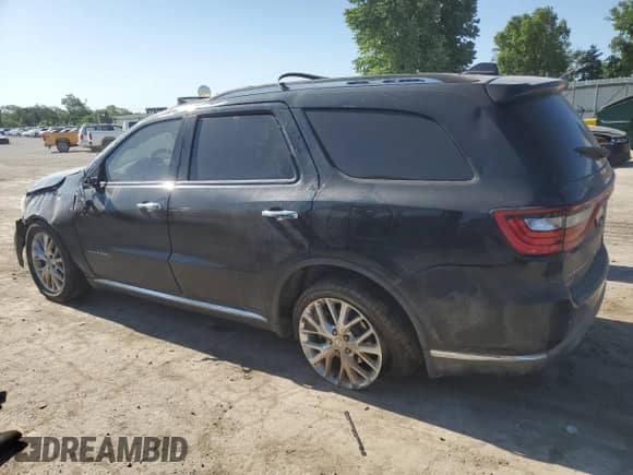 2015 Dodge Durango Citadel with VIN 1C4RDHEG6FC120313, listed as a Copart auction lot 57487185 with 174,123 mi miles and Salvage title. Bid and sale history available at DreamBid. Image 2.