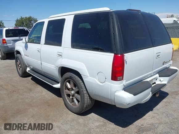 2000 Cadillac Escalade with VIN 1GYEK63R5YR222855, listed as a IAAI auction lot 42851593 with 159,717 mi miles and . Bid and sale history available at DreamBid. Image 3.