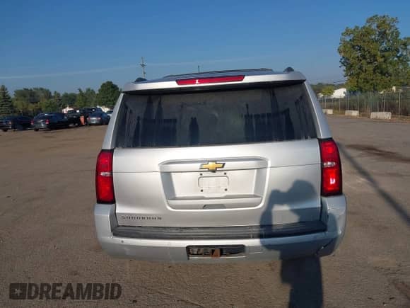2020 Chevrolet Suburban LT with VIN 1GNSKHKC6LR304885, listed as a IAAI auction lot 43213423 with 179,235 mi miles and . Bid and sale history available at DreamBid. Image 16.