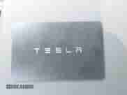 2023 Tesla Model Y Long Range with VIN 7SAYGDEE5PA177066, listed as a IAAI auction lot 43011026 with 21,962 mi miles and . Bid and sale history available at DreamBid. Image 11.