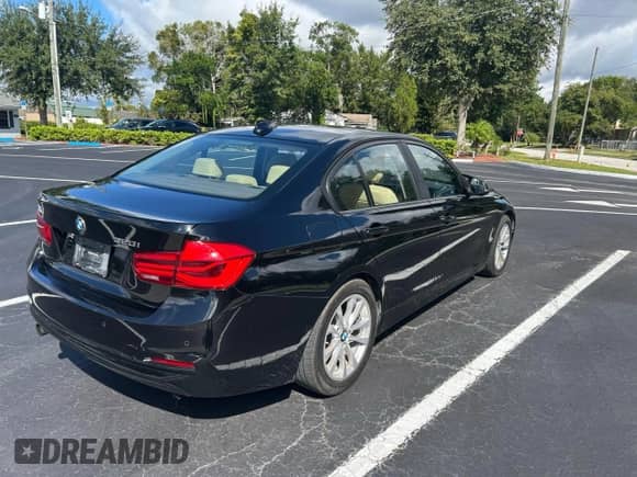 2017 BMW 3 Series 320i with VIN WBA8E1G53HNU12873, listed as a Copart auction lot 90667215 with 151,373 mi miles and Clean title. Bid and sale history available at DreamBid. Image 4.