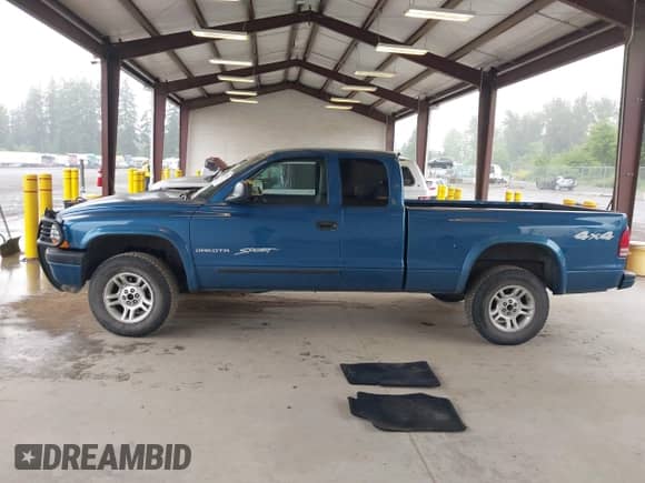 2004 Dodge Dakota Sport with VIN 1D7HG32N14S574163, listed as a IAAI auction lot 42381943 with 153,773 mi miles and . Bid and sale history available at DreamBid. Image 14.