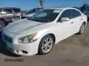 2014 Nissan Maxima SV z VIN 1N4AA5APXEC905450, wystawiony jako IAAI lot #42692323 z przebiegiem 187 955 mil mil oraz . Historia ofert i sprzedaży dostępna na DreamBid. Obrazek 2.