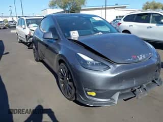 2022 Tesla Model Y Performance with VIN 7SAYGDEFXNF499324, listed as a IAAI auction lot 43073293 with 58,759 mi miles and . Bid and sale history available at DreamBid. Image 1.