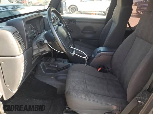 2003 Jeep Wrangler Rubicon с VIN 1J4FA69S23P310588, выставлен на аукционе Copart как лот 66919775 с пробегом 106 685 миль миль и Списание • Salvage title. История ставок и продаж доступна на DreamBid. Изображение 7.