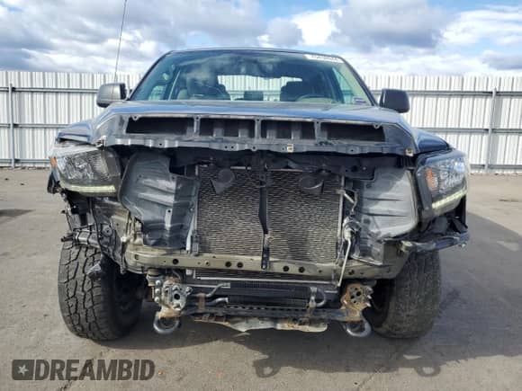 2019 Toyota Tundra SR с VIN 5TFUM5F13KX082805, выставлен на аукционе Copart как лот 75438944 с пробегом 122 236 миль миль и Списание • Salvage title. История ставок и продаж доступна на DreamBid. Изображение 5.