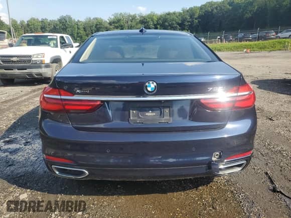 2016 BMW 7 Series 750i xDrive with VIN WBA7F2C54GG418169, listed as a Copart auction lot 69244195 with 100,392 mi miles and Clean title. Bid and sale history available at DreamBid. Image 6.