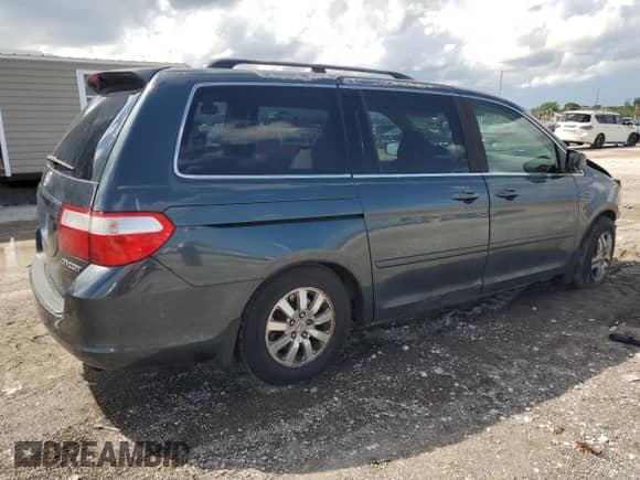 2005 Honda Odyssey EX с VIN 5FNRL38495B401224, выставлен на аукционе Copart как лот 80556355 с пробегом 258 303 миль миль и Списание • Salvage title. История ставок и продаж доступна на DreamBid. Изображение 3.