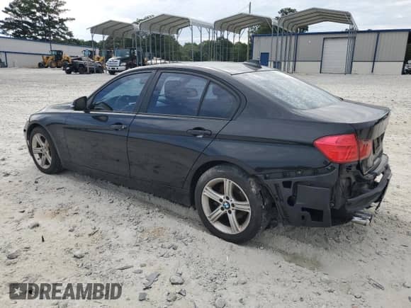 2013 BMW 3 Series 328i with VIN WBA3A5C56DF354801, listed as a Copart auction lot 70557105 with 157,284 mi miles and Salvage title. Bid and sale history available at DreamBid. Image 2.
