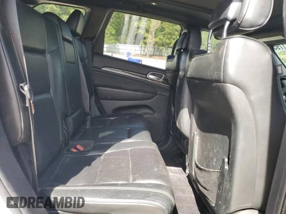 2017 Jeep Grand Cherokee Overland with VIN 1C4RJFCGXHC964499, listed as a Copart auction lot 71671795 with 117,302 mi miles and Salvage title. Bid and sale history available at DreamBid. Image 11.