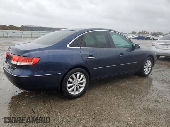 2007 Hyundai Azera SE с VIN KMHFC46F17A153197, выставлен на аукционе Copart как лот 81378254 с пробегом 167 583 миль миль и Списание • Salvage title. История ставок и продаж доступна на DreamBid. Изображение 3.