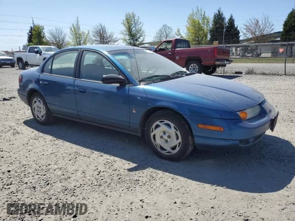 2001 Saturn SL with VIN 1G8ZK547X1Z294553, listed as a Copart auction lot 53786805 with 288,011 mi miles and Salvage title. Bid and sale history available at DreamBid. Image 4.