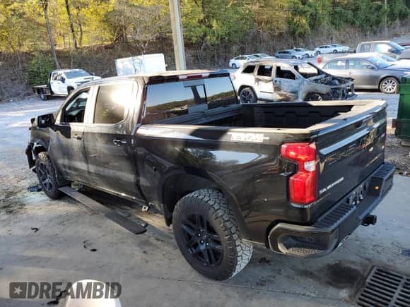 2023 Chevrolet Silverado 1500 LT Trail Boss with VIN 3GCUDFED1PG244640, listed as a Copart auction lot 87000205 with 52,000 mi miles and Salvage title. Bid and sale history available at DreamBid. Image 2.