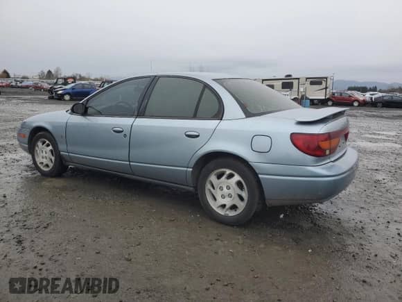 2002 Saturn SL with VIN 1G8ZK52772Z290447, listed as a Copart auction lot 68545105 with 183,346 mi miles and Salvage title. Bid and sale history available at DreamBid. Image 2.