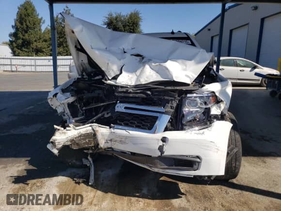 2015 Chevrolet Tahoe LT with VIN 1GNSKBKC2FR182883, listed as a Copart auction lot 70604715 with Not provided miles and Salvage title. Bid and sale history available at DreamBid. Image 5.