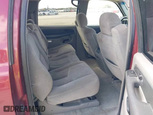 2003 Chevrolet Suburban LT z VIN 1GNEC16Z13J247753, wystawiony jako IAAI lot #41501608 z przebiegiem 300 977 mil mil oraz . Historia ofert i sprzedaży dostępna na DreamBid. Obrazek 8.