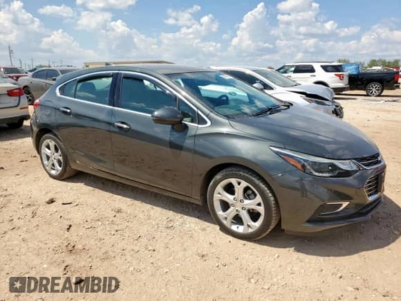 2018 Chevrolet Cruze Premier с VIN 3G1BF6SM8JS600116, выставлен на аукционе Copart как лот 70561595 с пробегом 55 099 миль миль и Чистый • Clean title. История ставок и продаж доступна на DreamBid. Изображение 4.