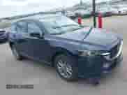 2024 Mazda CX-5 S Preferred z VIN JM3KFBCL2R0446390, wystawiony jako IAAI lot #42624381 z przebiegiem 21 293 mil mil oraz . Historia ofert i sprzedaży dostępna na DreamBid. Obrazek 1.