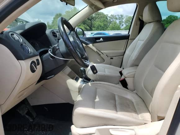 2013 Volkswagen Tiguan SE with VIN WVGAV7AX0DW556558, listed as a Copart auction lot 55574395 with 94,882 mi miles and Salvage title. Bid and sale history available at DreamBid. Image 7.