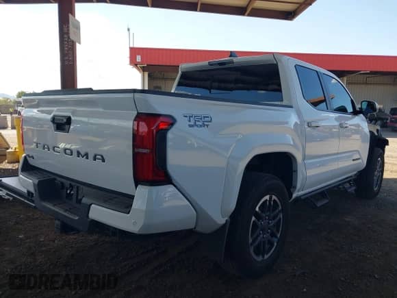 2024 Toyota Tacoma SR5 with VIN 3TMLB5JN2RM050911, listed as a IAAI auction lot 43169415 with 19,000 mi miles and . Bid and sale history available at DreamBid. Image 4.