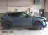 2025 Mazda CX-5 S Carbon Edition z VIN JM3KFBCM2S0623499, wystawiony jako IAAI lot #42865410 z przebiegiem 15 933 mil mil oraz . Historia ofert i sprzedaży dostępna na DreamBid. Obrazek 14.