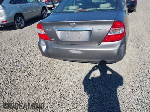 2004 Toyota Camry LE with VIN 4T1BE30K84U795211, listed as a IAAI auction lot 43341888 with 241,915 mi miles and . Bid and sale history available at DreamBid. Image 12.