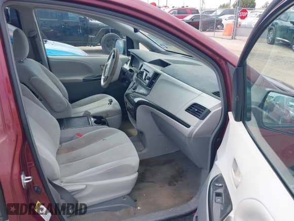 2014 Toyota Sienna LE AAS with VIN 5TDKK3DC2ES491717, listed as a IAAI auction lot 43056857 with 214,762 mi miles and . Bid and sale history available at DreamBid. Image 5.