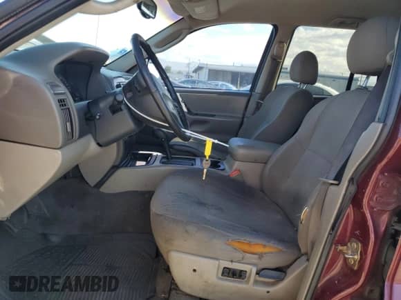 2002 Jeep Grand Cherokee Laredo with VIN 1J4GX48SX2C310790, listed as a Copart auction lot 85556515 with 165,485 mi miles and Salvage title. Bid and sale history available at DreamBid. Image 7.