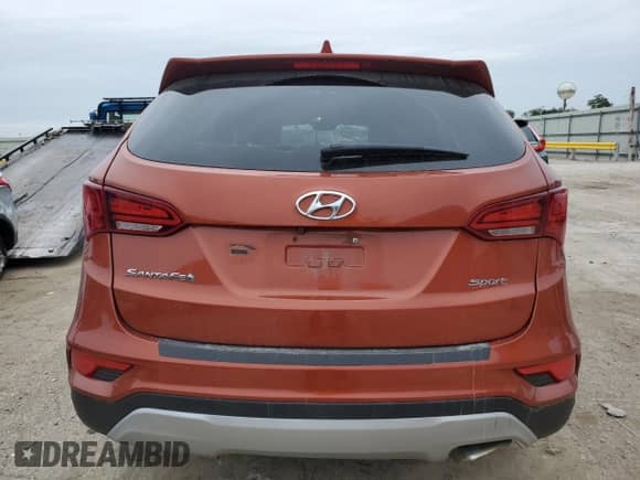 2017 Hyundai Santa Fe 2.4L с VIN 5XYZUDLB8HG487843, выставлен на аукционе Copart как лот 70696665 с пробегом 153 548 миль миль и Списание • Salvage title. История ставок и продаж доступна на DreamBid. Изображение 6.