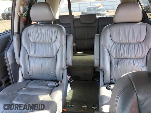 2007 Honda Odyssey EX-L z VIN 5FNRL38617B040477, wystawiony jako Copart lot #86307175 z przebiegiem 108 279 mil mil oraz Szkoda całkowita • Salvage title. Historia ofert i sprzedaży dostępna na DreamBid. Obrazek 10.