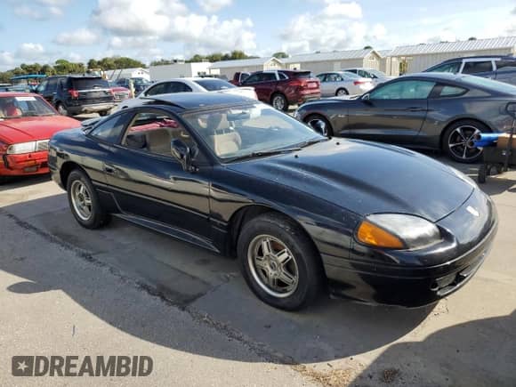 1994 Dodge Stealth with VIN JB3AM44H6RY026232, listed as a Copart auction lot 75196214 with 172,456 mi miles and Salvage title. Bid and sale history available at DreamBid. Image 4.