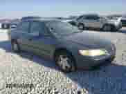 1998 Honda Accord EX with VIN 1HGCG565XWA065628, listed as a Copart auction lot 87243474 with 274,618 mi miles and Salvage title. Bid and sale history available at DreamBid. Image 4.