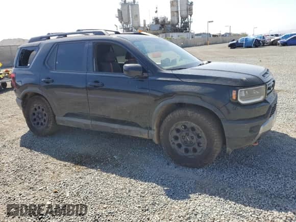 2026 Honda Passport with VIN 5FNYF9H53TB001381, listed as a Copart auction lot 71696325 with 8,648 mi miles and Salvage title. Bid and sale history available at DreamBid. Image 4.