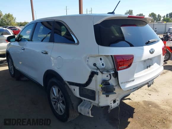 2019 Kia Sorento LX with VIN 5XYPG4A56KG470350, listed as a IAAI auction lot 42814201 with 142,132 mi miles and . Bid and sale history available at DreamBid. Image 3.