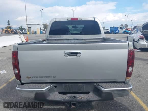 2010 Chevrolet Colorado 1LT z VIN 1GCDSCDE5A8148912, wystawiony jako IAAI lot #41752099 z przebiegiem Nie podano mil oraz . Historia ofert i sprzedaży dostępna na DreamBid. Obrazek 16.