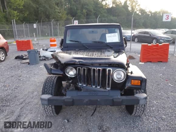 2001 Jeep Wrangler SE with VIN 1J4FA29P01P350847, listed as a IAAI auction lot 42821806 with 205,522 mi miles and . Bid and sale history available at DreamBid. Image 12.