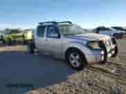 2006 Nissan Frontier LE with VIN 1N6AD07U66C416785, listed as a Copart auction lot 82629405 with 174,566 mi miles and Salvage title. Bid and sale history available at DreamBid. Image 4.