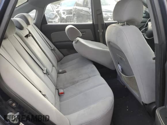 2009 Hyundai Elantra GLS z VIN KMHDU46D89U694364, wystawiony jako Copart lot #87024635 z przebiegiem 182 885 mil mil oraz Szkoda całkowita • Salvage title. Historia ofert i sprzedaży dostępna na DreamBid. Obrazek 10.