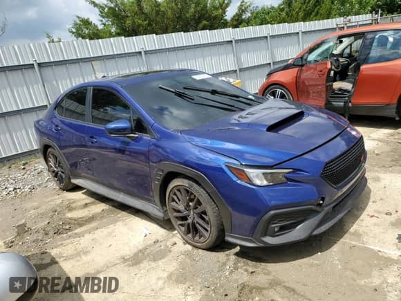 2023 Subaru WRX Premium with VIN JF1VBAF62P9816320, listed as a Copart auction lot 65215655 with 30,668 mi miles and Salvage title. Bid and sale history available at DreamBid. Image 4.