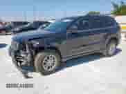 2018 Jeep Grand Cherokee Laredo z VIN 1C4RJEAG2JC480930, wystawiony jako Copart lot #65184965 z przebiegiem 70 700 mil mil oraz Szkoda całkowita • Salvage title. Historia ofert i sprzedaży dostępna na DreamBid. Obrazek 1.