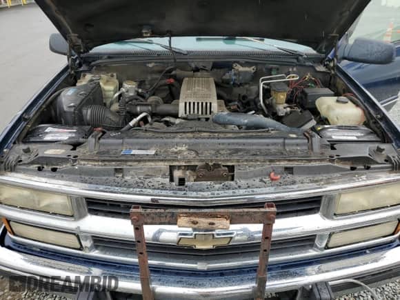 1995 Chevrolet Silverado 2500 с VIN 1GCGK29F0SE191453, выставлен на аукционе Copart как лот 70738085 с пробегом 192 263 миль миль и Списание • Salvage title. История ставок и продаж доступна на DreamBid. Изображение 11.