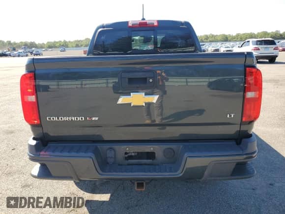 2018 Chevrolet Colorado 4WD LT z VIN 1GCGTCENXJ1104227, wystawiony jako Copart lot #80279845 z przebiegiem 33 565 mil mil oraz Szkoda całkowita • Salvage title. Historia ofert i sprzedaży dostępna na DreamBid. Obrazek 6.